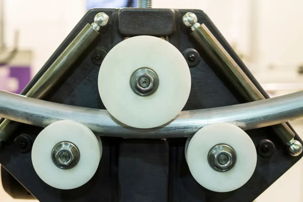Aluminum tube bending springback compensation and radian precision control